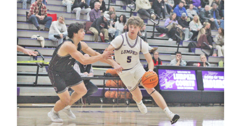 Lumpkin County’s TJ Gaddis drives down the court during last week’s game against Chestatee.
