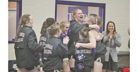 Maxine Sullens and the Lumpkin County High School team celebrate their State Championship victory.