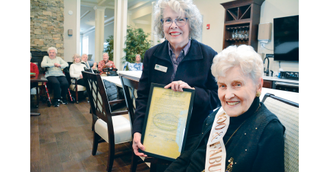 Mayor JoAnne Taylor presents a proclamation from the Dahlonega City Council on Margaret Owen’s 100th Birthday recognizing her for years of contributions to the local community.