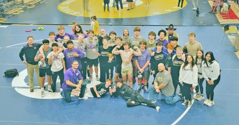 The Lumpkin County wrestling team celebrates their third place finish at the Class AAA State Dual Championships.