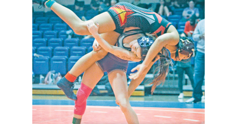 Cadence Grulla lands a big throw against an opponent. Grulla was one of several wrestlers to advance to Sectionals to represent Lumpkin. (photo by Eligha Roper)
