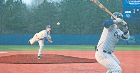 Jayzen Johnson delivers a pitch against Coahulla Creek.