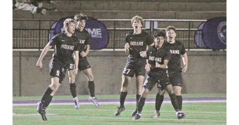 The Lumpkin County boys soccer team celebrates a goal against region rival White County.