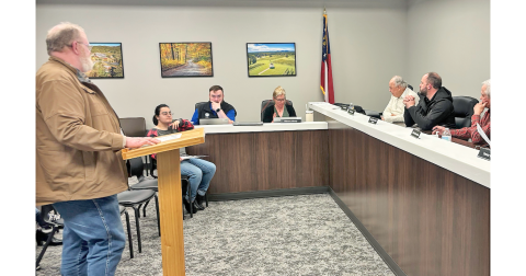 Larry Reiter addresses the Lumpkin County Planning Commission as the group entertains a variance request for a new convenience store on Auraria Road.