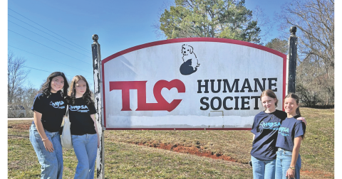 Lumpkin County High School sophomores (from left) Emma Rodriguez, Josie Tullis, Helana Tullis and Blakely Bell recently toured the Dahlonega TLC Humane Society as part of their HOSA student service project.