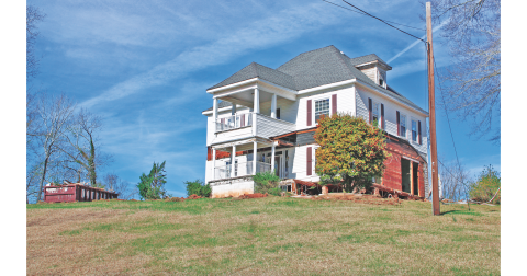 A crew from Bent Nails Construction has been working to remove the porches and any additions to the original 1898 Hillcrest House in preparation for its eventual relocation.