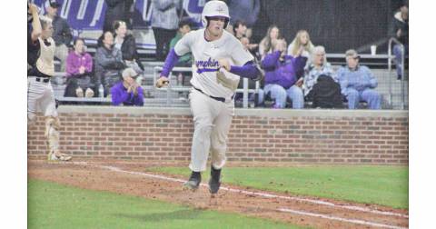 Matthew Mitchell picks up a hit against Flowery Branch.