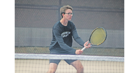 Barrett Wilkinson awaits a serve from his Johnson opponent.