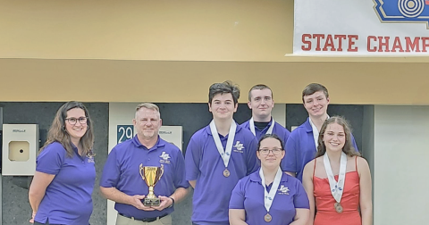 The LCHS Rifle Team took the podium in Waycross to receive their third-place trophy.