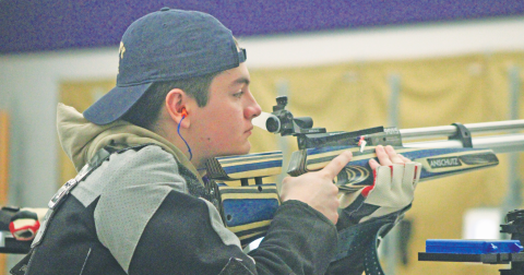 Lumpkin County’s Liam Kearney lines up a shot during a meet this season.