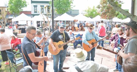 Musicians gather to join the jam sessions for some old-time and bluegrass music making throughout the weekend, beginning on Friday evening around the Square.