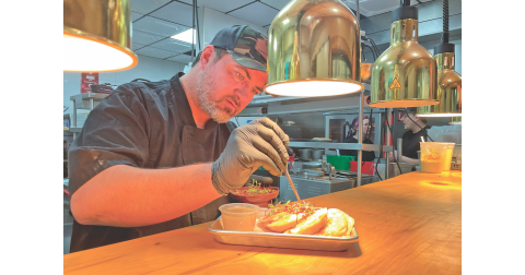 Co-owner Chris Matson prepares his signature pierogi dish, a tribute to his roots and his grandmother’s recipe.