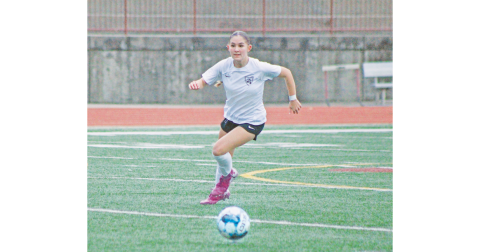 Lumpkin County’s Aubree Brown runs down a ball during a game this season.