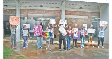 University of North Georgia students held up signs and chanted slogans on the patio of the Hoag Student Center last Thursday to oppose rumored changes to the Multicultural Student Affairs program.