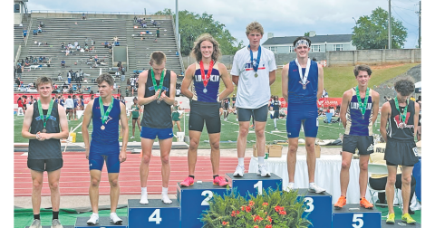 Brothers Wyatt Windham (second) and Witt Windham (fifth) stand on the State Championship podium together.