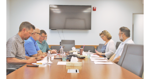 Chestatee Regional Library Director Leslie Clark and Business Manager Jonathan Smith (pictured on right) discuss library operations with the Board of Commissioners during a special session on the 2026 budget. 