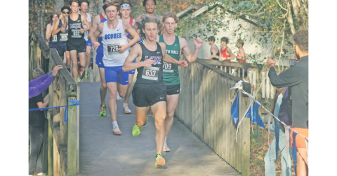 Lumpkin County’s standout runner Wyatt Windham leads the pack in a previous race. Windham will now compete for Georgia Tech.