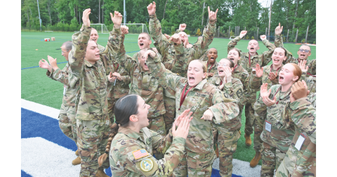 New University of North Georgia cadets congratulate their peers on the successful completion of a team-building challenge on Radar Ridge during FROG Week.