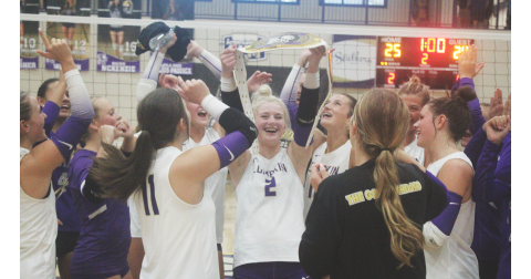 Averie Simmons celebrates alongside her teammates after she’s awarded the Player of The Week belt.