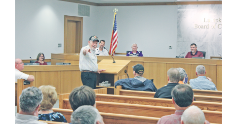 Former Lumpkin County Veterans Affairs Committee Chairman Bill Poole recognized some fellow retired Rangers in the audience before urging the Board of Commissioners to approve a local Veterans Memorial Cemetery.