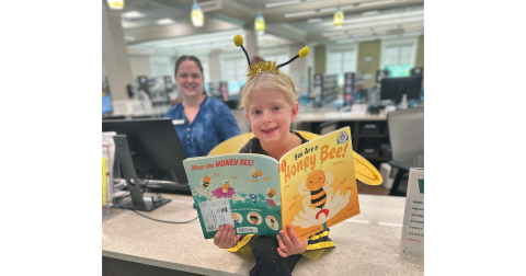 A local winged celebrity buzzed by the Lumpkin County Library recently to help spread the news about the upcoming Lumpkin Literacy Adult Spelling Bee & Variety Show which is taking place October 7 at 7 p.m. in the University of North Georgia’s Hoag Auditorium. Admission is free to the donation-only event. Pictured, Eleanora Sizemore, the actual Spelling Bee, will be making appearances in The Nugget in the weeks leading up to the big show as she visits key contributors to the cause of local literacy.