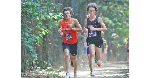 Lumpkin runner Witt Windham (right) won his third straight race this season at UNG’s Oakwood course.