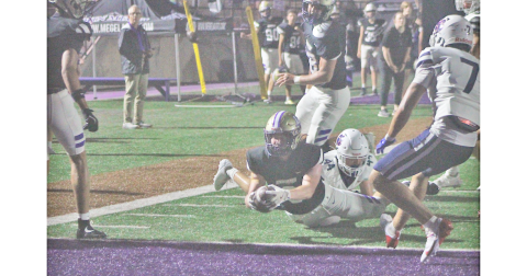 Lumpkin County’s Nolan Matthews dives into the end zone for an Indians touchdown versus Dunwoody.