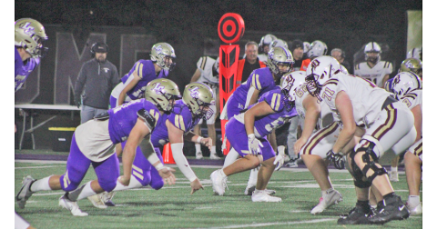 Lumpkin County’s defensive line faces off with Dawson’s offense.