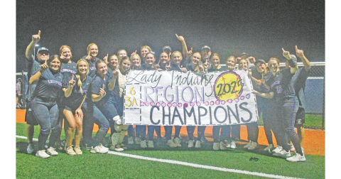 The Lady Indians softball team celebrates its Region Championship, following the big win over White County.