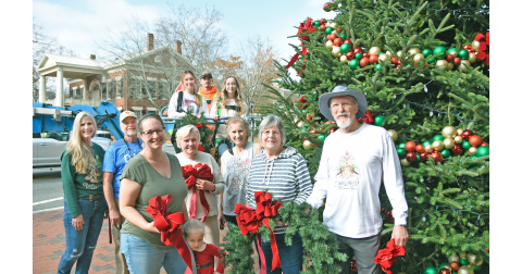 A team of volunteers from the Old Fashioned Christmas Committee, along with City of Dahlonega employees, adorned the downtown tree with homemade decorations. Big crowds are expected in downtown Dahlonega for the annual Lighting of the Square this Friday. Local activities will last throughout the Christmas season.