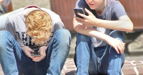 Should a new state law that will limit cell phones for students at school in elementary and middle, also be extended to the high school level?