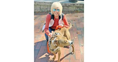 Diana Dunetz, co-founder of the Run for the Rescues 5K, with Lumpkin County Animal Shelter resident Bishop, who is looking for his forever home.