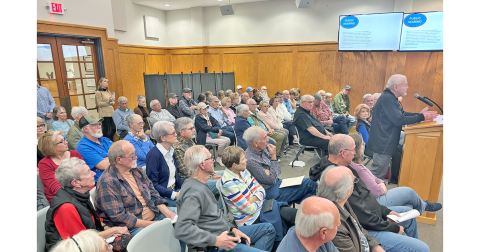 It was standing-room only in City Hall on Monday as local residents expressed their concerns about a proposed townhome development off Highway 60.