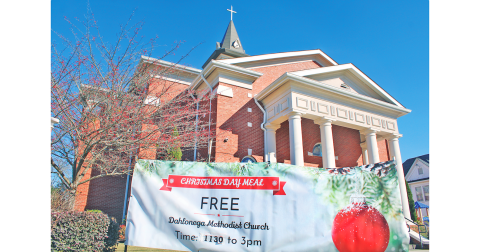 A banner hanging in front of Dahlonega Methodist Church on South Park Street advertises their upcoming free Christmas Day Meal for the community, which will be served from 11:30 a.m. to 3 p.m. inside the Fellowship Hall.