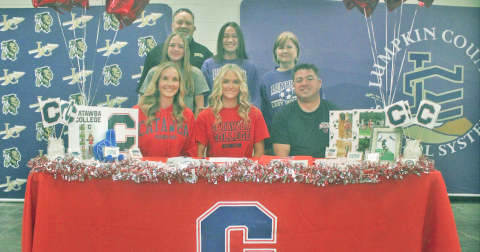 Lumpkin County soccer senior standout Kaitlyn Johnson celebrates her college signing with her family and coaches.