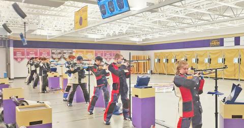 The LCHS rifle team takes aim during a recent match.