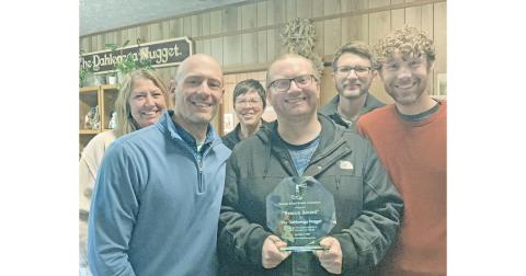 The Dahlonega Nugget was honored to receive a 2025 Beacon Award from the GSBA. Pictured, from left, are Office Manager Chauna Utterback, Editor/Publisher John Bynum, Advertising Consultant Erin Riley, Sports Reporter Eligha Roper, Staff Writer Keith Murden and Executive Editor Matt Aiken.