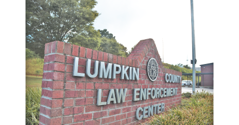 A pair of Lumpkin County Detention Center officers have been relieved of their duties after being charged with underage alcohol related offenses.