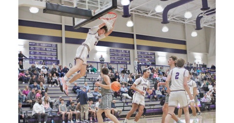 Lumpkin’s Martin Hulsey throws down a dunk over White County.