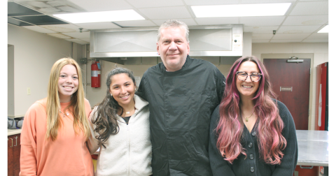 Pictured inside the Parks & Rec kitchen are (from left) Front Desk Associates Cali Timms and Cody Jackson, Chef Steve Hewins and Administrative Coordinator Scarlet Shumate.