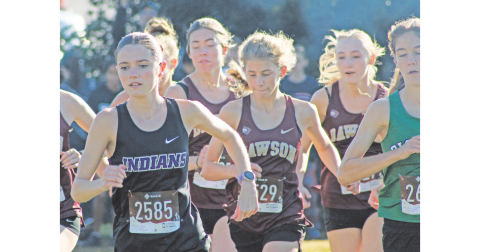 Lumpkin County’s Keli George (left) leads a pack of runners.