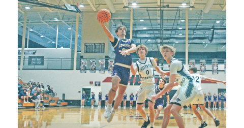 Lumpkin County’s Landon Pierce goes up for a basket against Chestatee.