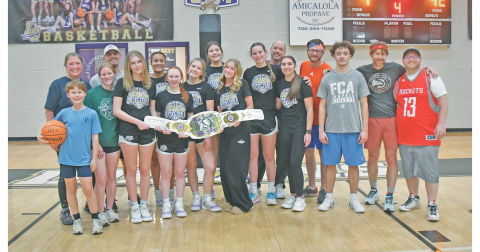 The Lady Indians and Team Nugget gather for a postgame photo, celebrating what was a very fun night on the Lumpkin County High School basketball court.