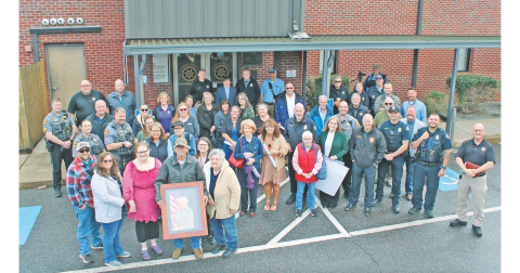 Family, friends and coworkers of the late Marie Satterfield gathered at the Sheriff’s Office on March 12 for a memorial plaque dedication.