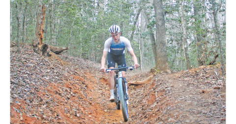 Lumpkin County cyclist Asher Boegner descends a section of trail during a recent outing.