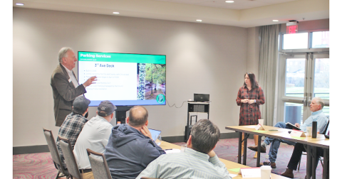 Rome Mayor Jim Boho and Downtown Development Authority Director Suzanne Roberts review parking solutions with the visiting Dahlonega City Council during a retreat earlier this year.