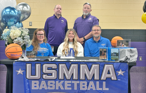 Local basketball star Maddie Lee signs her official commitment to the U.S. Merchant Marine Academy.
