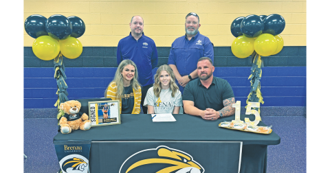 Lumpkin basketball player Alayna Lindley celebrates her college signing with her coaches and family.