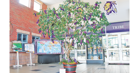 To commemorate Military Child Month this April, Lumpkin County High school adorned their ficus tree in the front lobby with a purple ribbon for each of the school’s 57 military-connected students. The ribbons were made by middle school students during the recent LCMS Community Connect Day.