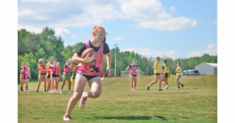 Addison Parker makes a play during last week’s tryouts for the  Lumpkin County High School flag football team. The season is set to begin in October.